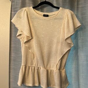 Beige and white short sleeve top.